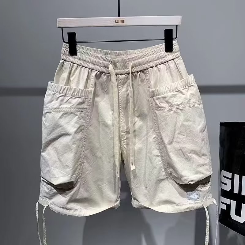 Monos de moda casuales de verano, pantalones de cinco puntos, pantalones cortos casuales microelásticos y transpirables para hombres, nuevos pantalones cortos multibolsillos