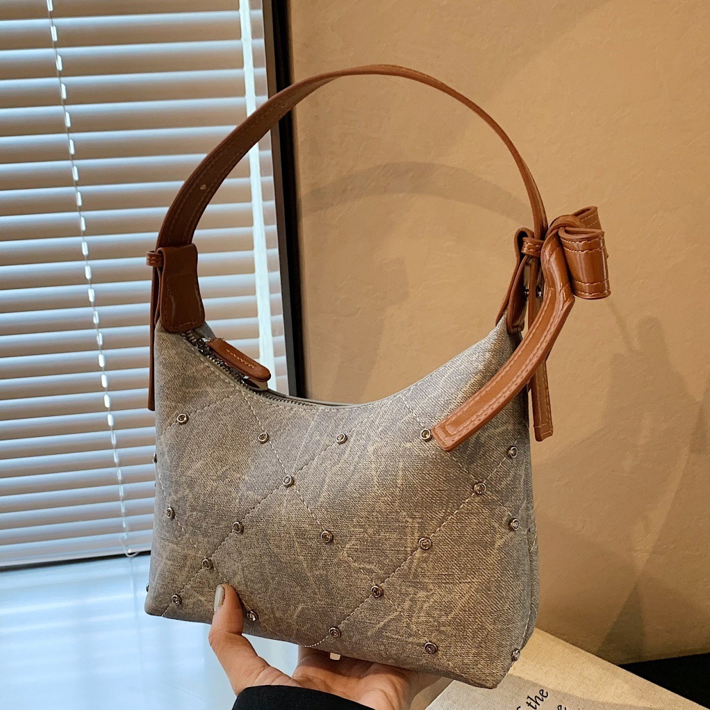 Diseño de color chocante empalme brazo bolso de mujer verano nuevo estilo de viaje diario versátil portátil de hombro mochila