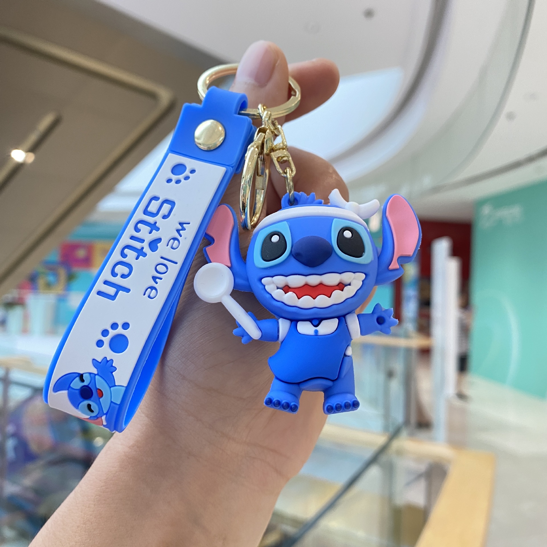 Cartoon Q versión puntada llavero moda fresco lindo colgante bebé captura máquina muñeca pareja pequeño regalo al por mayor