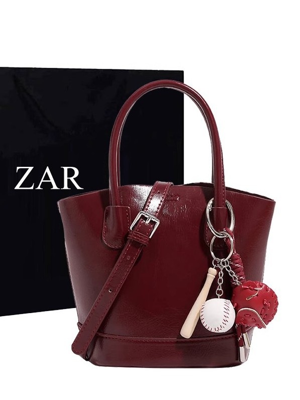 Alto sentido retro bolso de cubo rojo para mujeres otoño invierno nicho bolso de boda bolso portátil de viaje