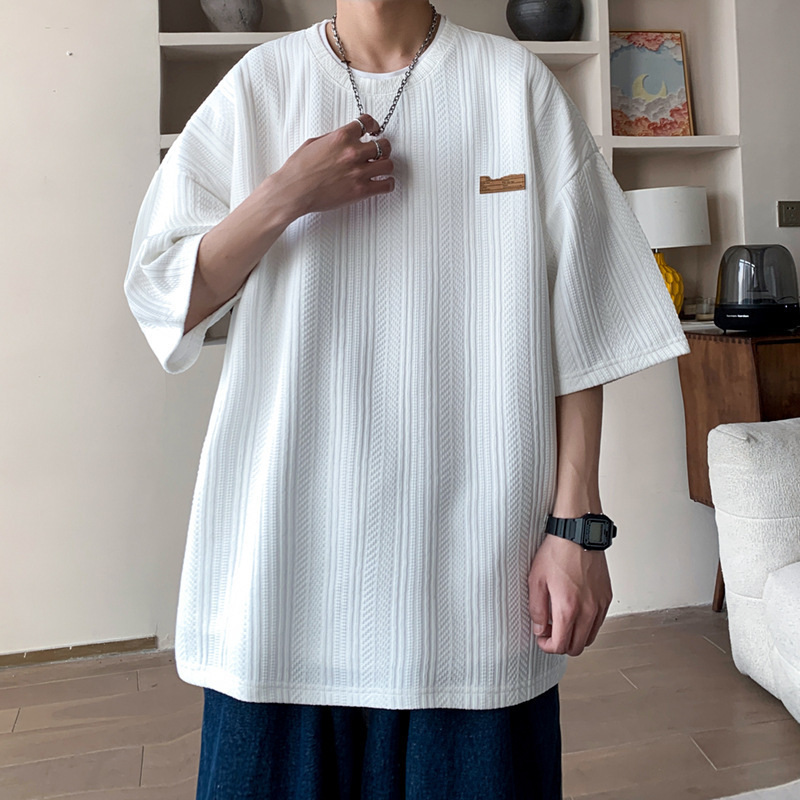 Camiseta de manga corta de verano de Hong Kong Tide para hombres inins coreanos sueltos versátiles Jacquard camiseta de cuello redondo de marca de marea chaqueta transpirable