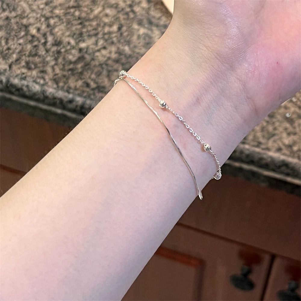 Small round beads ultra-fine double-layer bracelet women's light luxury niche design sense girlfriends cold and clear exquisite simple cold style bracelet