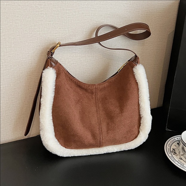 2025 otoño y invierno nuevo estilo retro de cuero de seda bolso de peludo de mujer bolso de cubo de peludo bolso de hombro de color de colisión bolso de mochila versátil