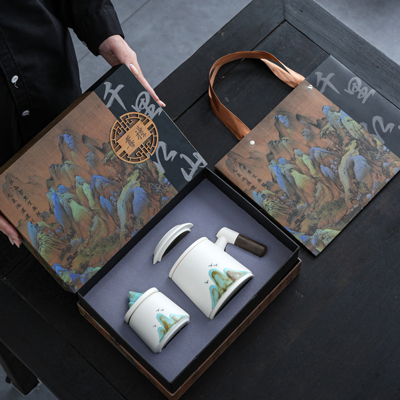 会社のビジネスセットの贈り物千里江山のノートパソコンの陶磁器のお茶の杯の贈り物のお土産は取引先にプレゼントします。|undefined