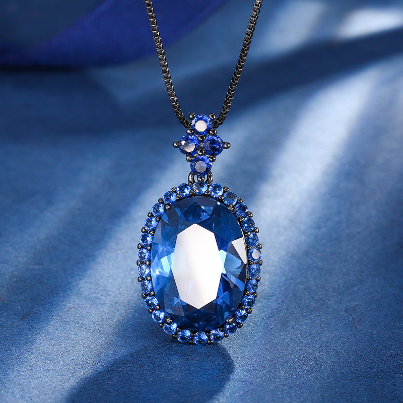 2024 nuevo Zhuang Sheng joyería fondo de cobre chapado en oro simulación azul puntiagudo cristal negro oro personalidad traje 13*18-12*16