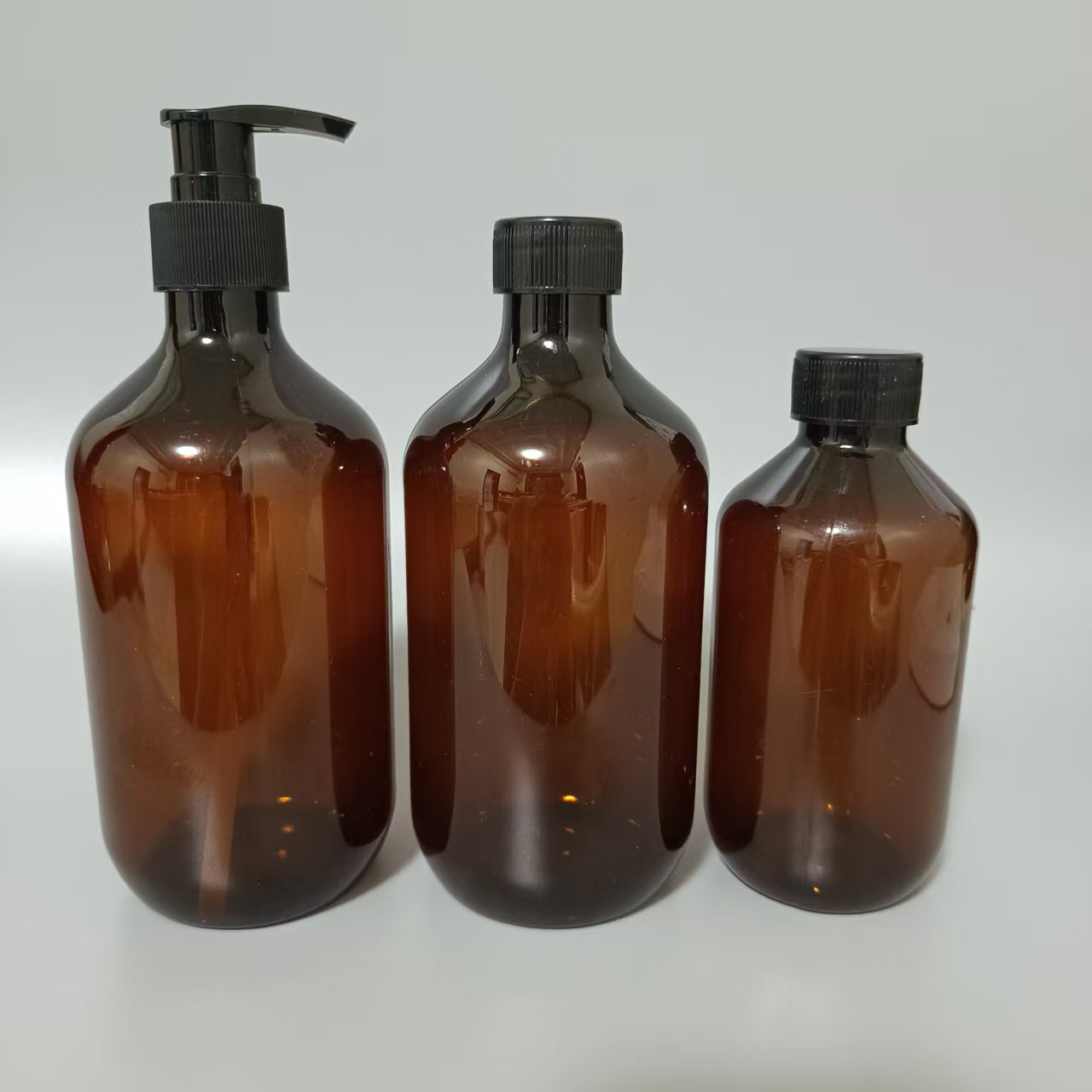 Stock 500ml ámbar PET baño tres piezas dispensador botellas de plástico PET 500ml botellas de plástico