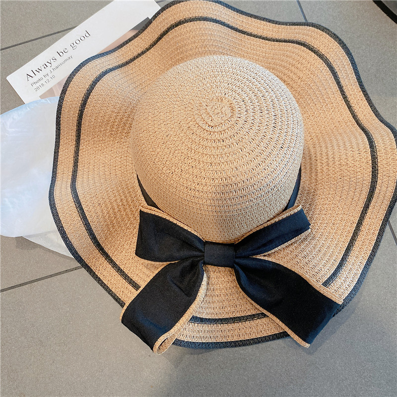 Women's Simple Style Bow Knot Big Eaves Straw Hat display picture 4