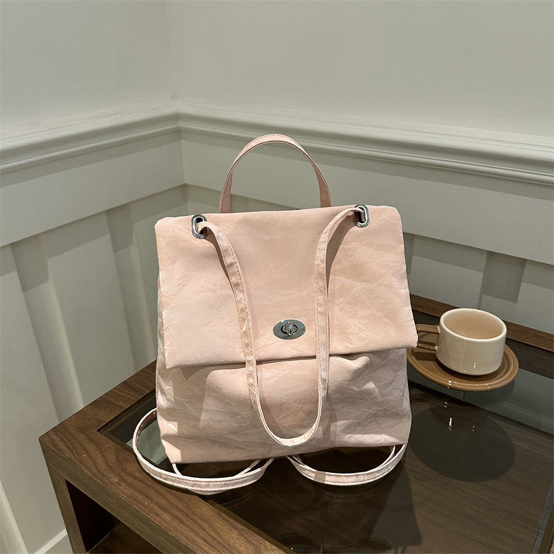 Mochila de moda coreana para mujeres 2024 verano nuevo estilo simple ocio de gran capacidad versátil mochila corta