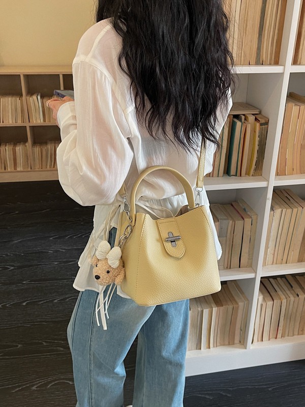 Bolsos de diseño de moda portátil cubo de agua, bolsos de bebé, nuevos patrones de litchi, bolsos de alta calidad prácticos.