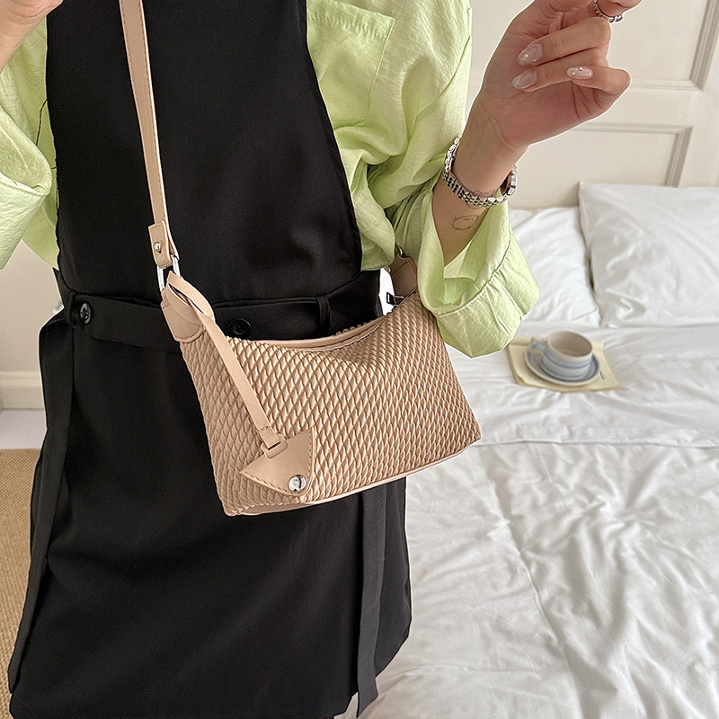 Nicho Zhong tejido bolso de brazo portátil mujeres 2026 nuevo versátil bolso de mano casual diario bolso de hombro sensación de bolso