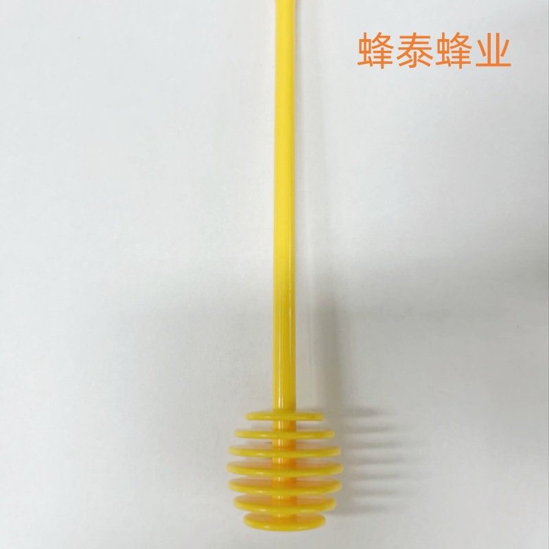 노란색 플라스틱 저어 스틱