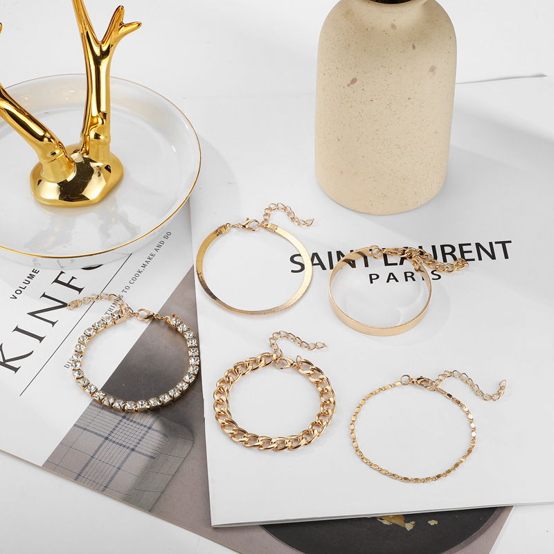 Pulsera de cadena de garra hecha a mano de cobre simple europeo y americano pulsera de traje de diamantes de imitación geométrica multi-elemento