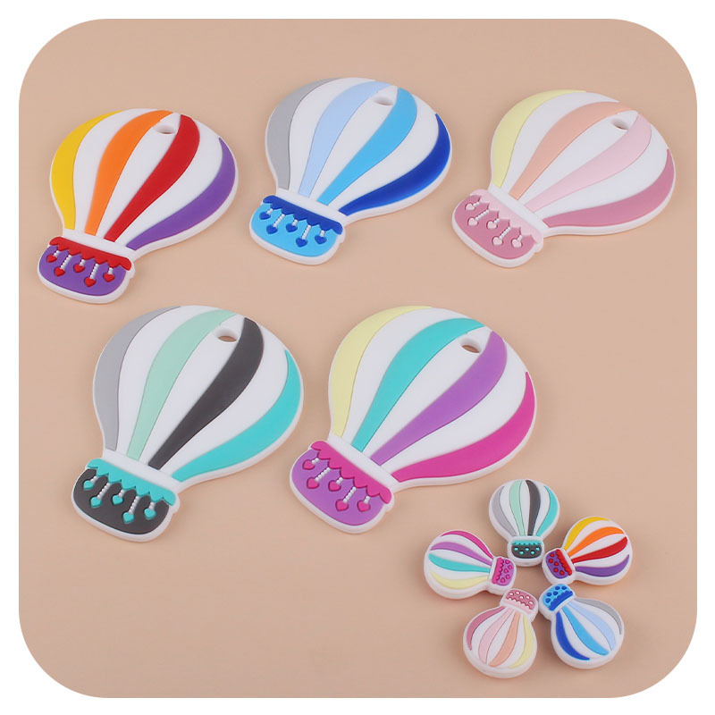 Bebé de dibujos animados colorido globo de aire caliente de silicona teether stick juguete entrenamiento del bebé dientes de molienda palo