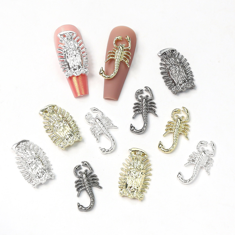 Nueva joyería de uñas de aleación de escorpión transfronteriza pistola de oro y plata pegatina de uñas negro tridimensional estatua de Buda joyería de uñas al por mayor