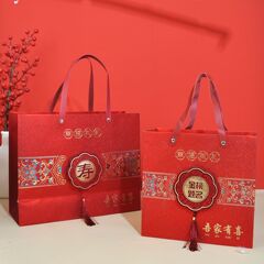 中国式結婚式の手提げ喜糖袋彩金のお土産手提げ袋の婚約プレゼント袋のお返しの誕生祝いのプレゼント袋は卸売りします。