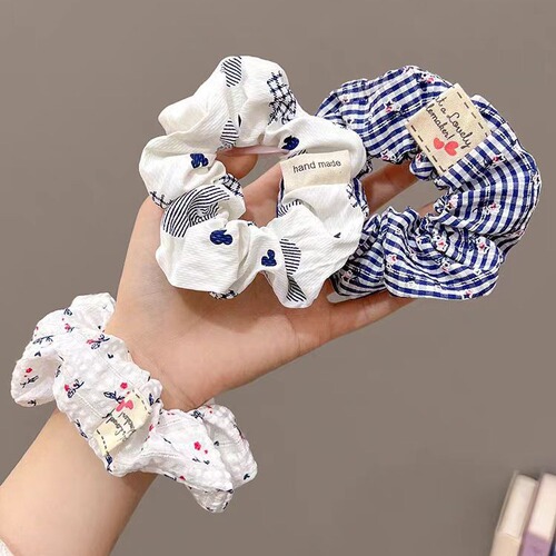 Vintage artistic style blue and white plaid hair tie with small floral pattern, large intestine hair ring, Mori girl versatile hair accessory for ponytail.