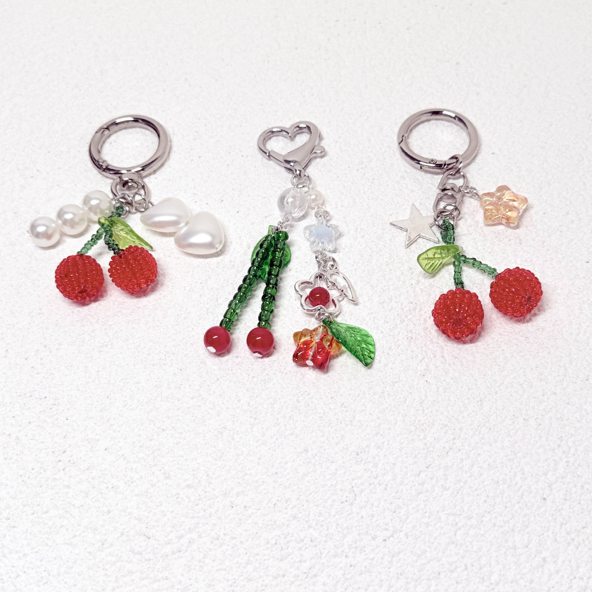 Cute Alloy Resin Star Cherry Unisex Bag Pendant Keychain display picture 1