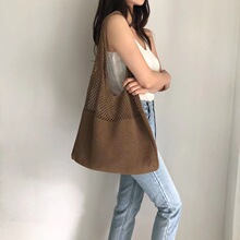 夏季镂空针织包包女新款南风高级感沙滩包百搭大容量通勤手提包