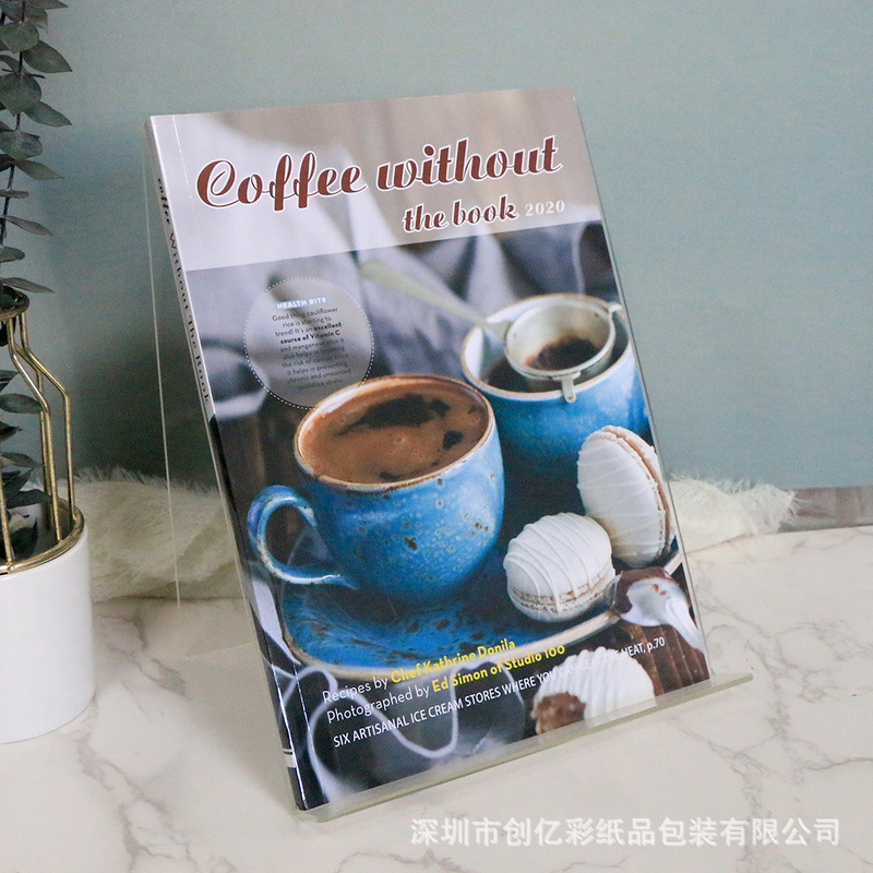テーブル食器のサンプルプレート間の撮影装飾書ホテルレストランのグルメカフェの装飾はページをめくることができます。|undefined