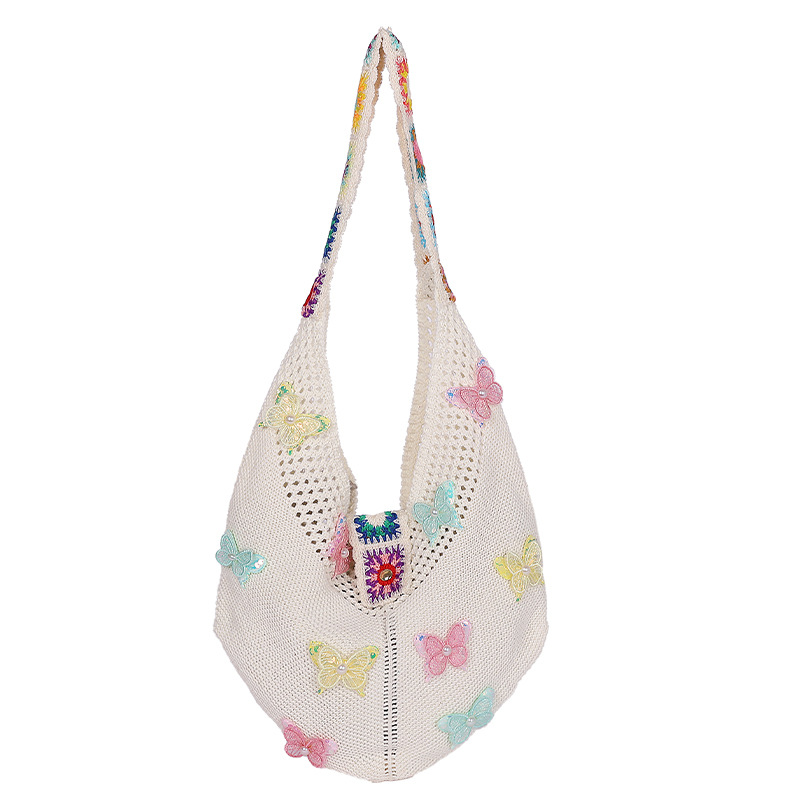 Versión coreana del bolso de nicho 2025 verano nuevo bolso femenino mariposa bolso tejido bolso de hombro de punto de gran capacidad