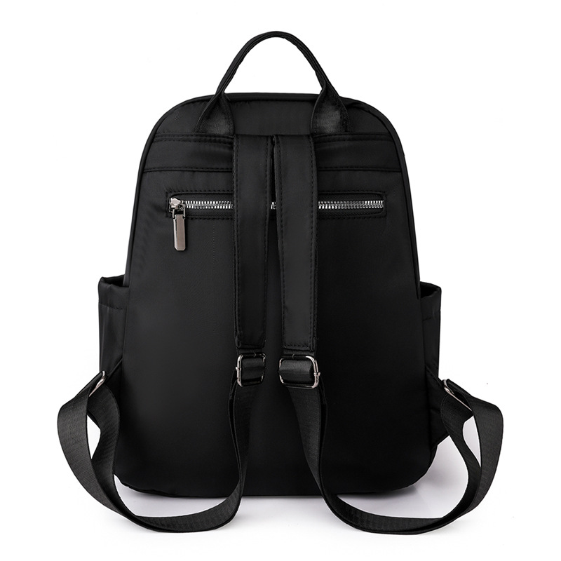 2023 nueva mochila de nailon para mujer coreana, mochila de viaje de gran capacidad para viajeros urbanos de todo fósforo de moda al por mayor