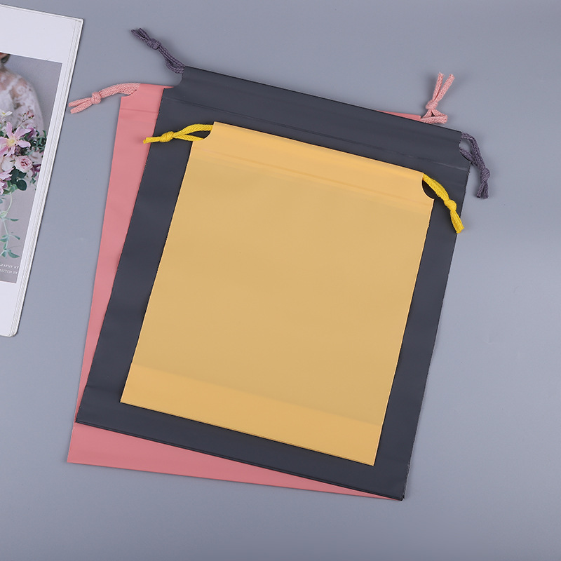 En stock al por mayor Eva esmerilado cordón bolsa color caramelo Almacenamiento de viaje ropa para niños bolsa de plástico cordón