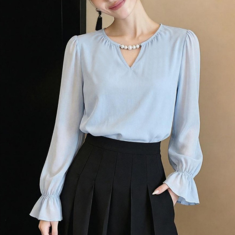 Soft, matte, hollow-out V-neck blouse, 2026 autumn collection, elegant and flowing chiffon top Soft, matte, hollow-out V-neck blouse, 2026 autumn collection, elegant and flowing chiffon top
