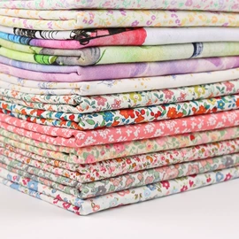 印花、扎染布;其它巾类