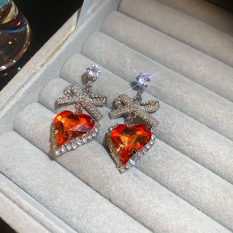 Aguja de plata Pendientes de lazo de diamantes coreanos Pendientes de temperamento de moda de todo fósforo Pendientes de diseño de nicho Sentido de lujo ligero