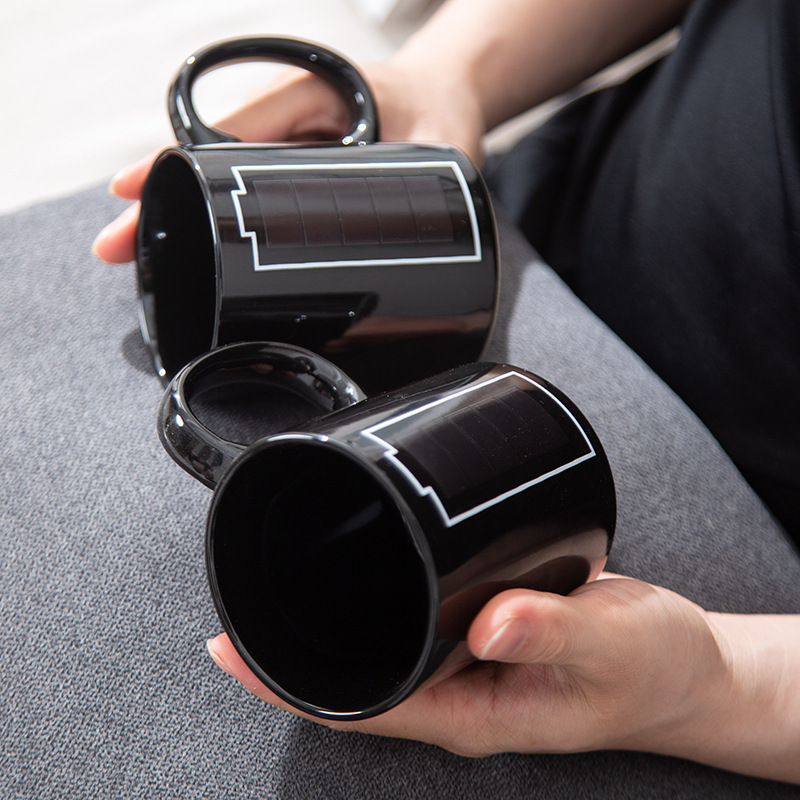 Fabricantes al por mayor de tazas de batería cambiantes de color tazas de marca de cambio de calor tazas de regalo de cerámica creativas tazas publicitarias tazas de sublimación en línea tazas