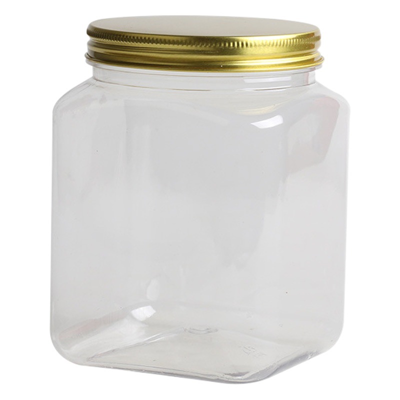 Fábrica en stock frasco de plástico cuadrado PET transparente grado alimenticio sellado frasco dos Jin botella de miel cubierta de aluminio jarra de granos