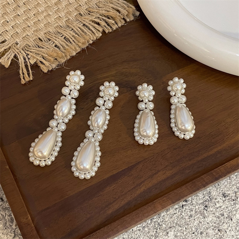 Brand design woven retro elegant earrings from pearl