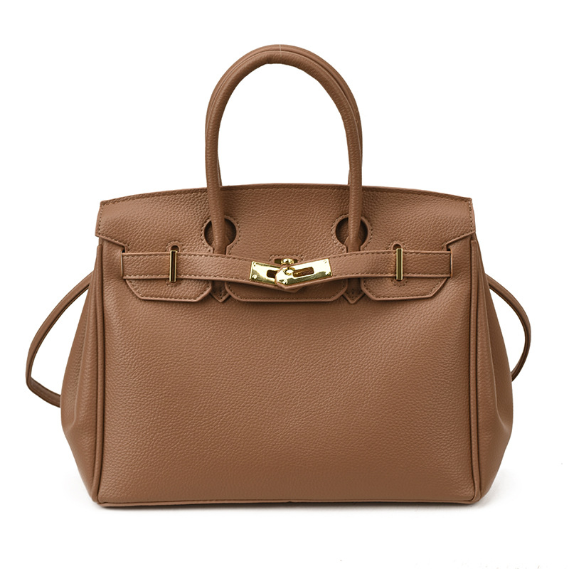 Bolsos de platino retro retro de alta calidad para mujeres 2026 comercio exterior nueva moda litchi pattern commuter mochila versátil