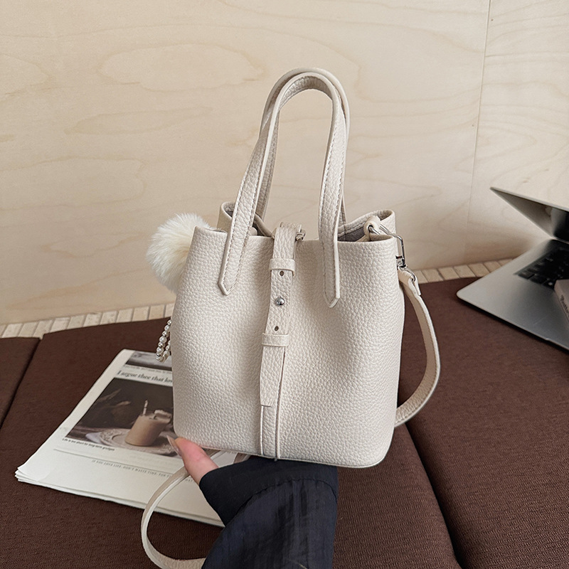 Nicho transfronterizo bolsas de cestas de verduras bolsas de cubo de mano otoño / invierno 2025 nuevo bolso de mujer moda retro mochila de hombro