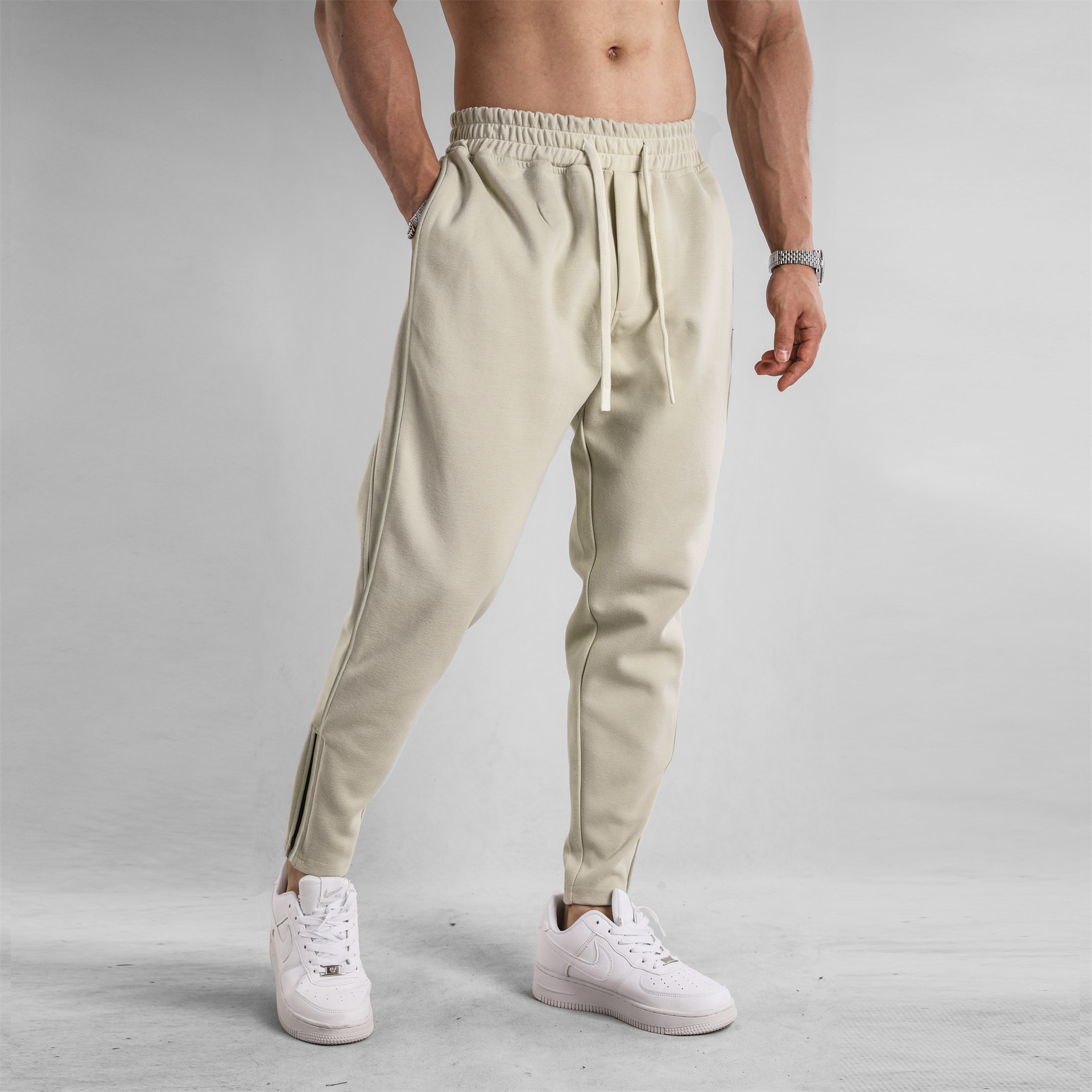 Pantalones largos de algodón de primavera y otoño para hombres, nuevos pies delgados, cremallera, pies, ocio, deportes de todo fósforo para jóvenes, al aire libre