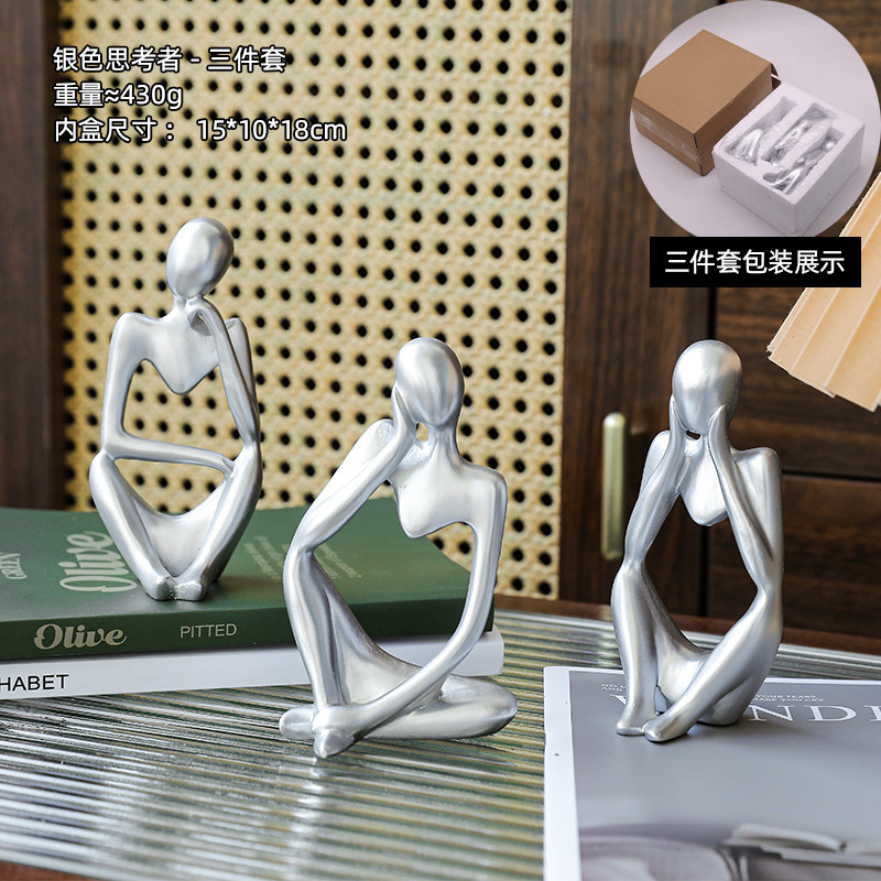 モダンなシンプルなリビングルームのサンプルプレートの間にソフトな装飾品があります。|undefined