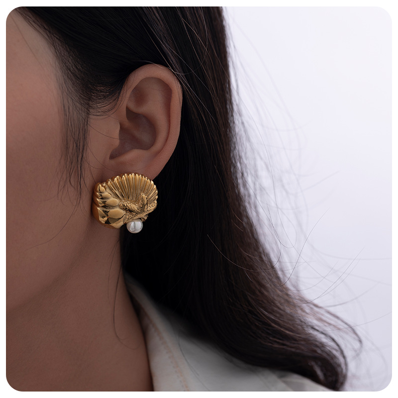 TENA Europa y América de moda conchas de diseño de estrellas de mar explosivo orejetas de acero inoxidable chapado en oro 18 quilates temperamento de orejetas marinas mujeres