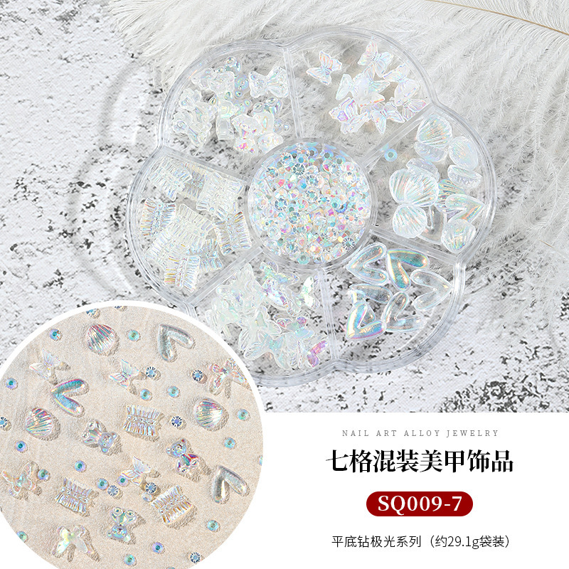 Seven-grid mixed Camellia nail jewelry bow flat diamond lollipop nail pequeña bola de acero Pearl Square Diamond