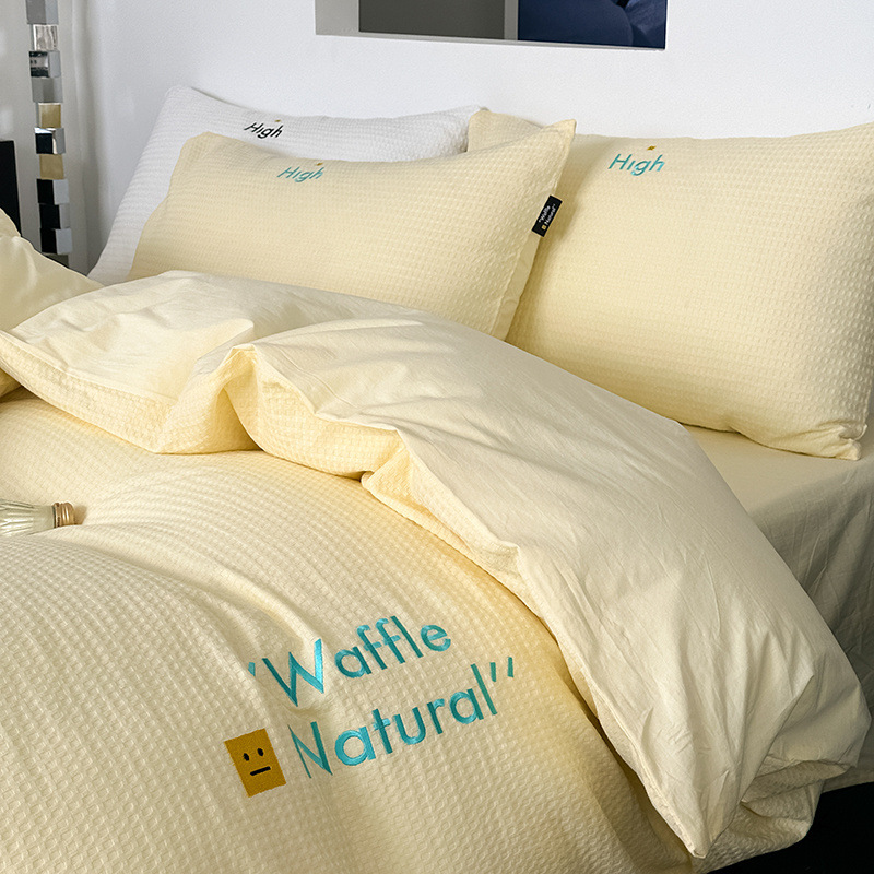 Estilo de clase A algodón waffle bordado de cuatro piezas conjunto simple 100 algodón hoja de cama edredón cubierta hoja equipada 4-piezas conjunto lote