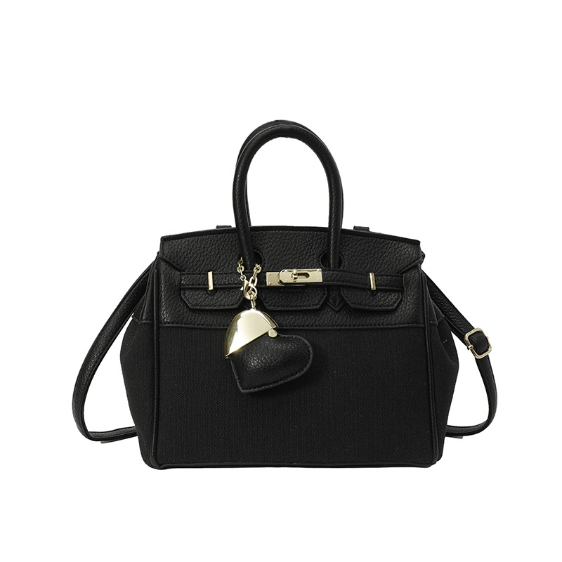 Bolso de tela de mujer color contrastante empalme bolso portátil Kylie bolsa de gran capacidad transfronteriza alta sensación de viaje bolsa de mano