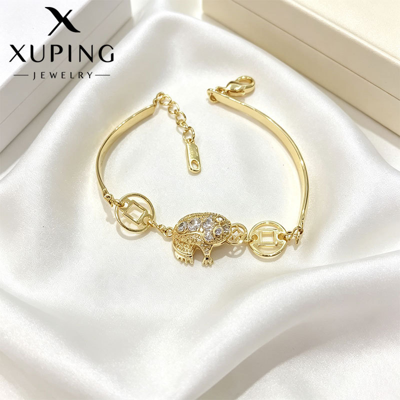 Xuping aleación de cobre chapado 14k comercio exterior transfronterizo de Europa y Estados Unidos incrustado con zircon tres nichos de tortuga pulseras de lujo ligeras