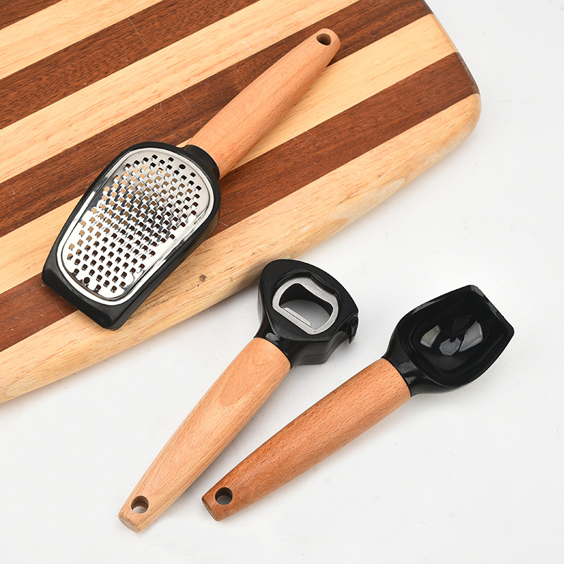 Mango de madera queso pala pizza cuchillo rodillo raspador cuchara de helado cuchillo de peeling sacos de cocina gadget set