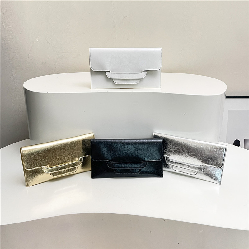 Bolso de mujer de color sólido bolso de cambio de mujer bolso de mano de alto valor de cara simple bolso corto de moda bolsa de sobres versátil