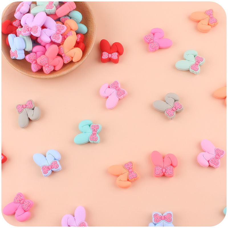 Bebé suministros de dibujos animados de silicona animal conejo mordedor arco DIY Cadena de chupete molar anti-gota cadena pequeños accesorios