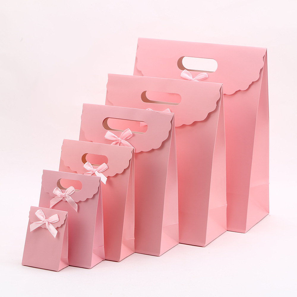 Bolsa de cartón blanco de color sólido Bolsa de regalo de color dopamina Bolsa de embalaje de regalo de gran capacidad LOGO se puede imprimir en bolsas de mano