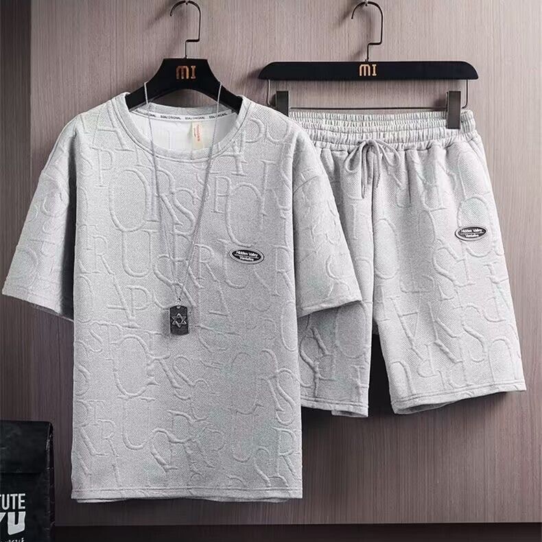 元のメーカーのレジャースポーツスーツの男性夏の薄いサイズのゆったりとしたカジュアルな半袖tシャツの半ズボンの2つのセット|undefined