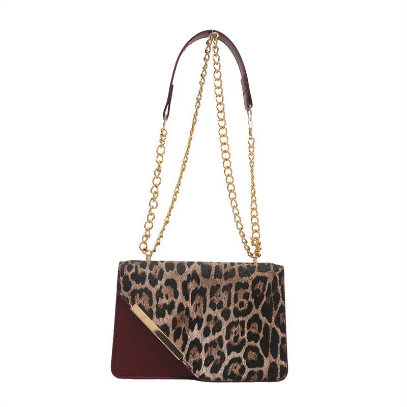 2024 invierno nuevo nicho diseño leopardo bolso de hombro de moda simple bolso de brazo cadenas mochila personalidad