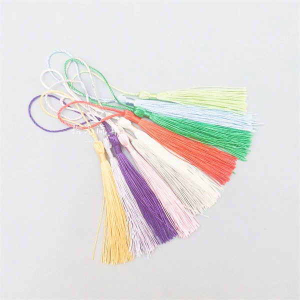 20 small tassels - random color