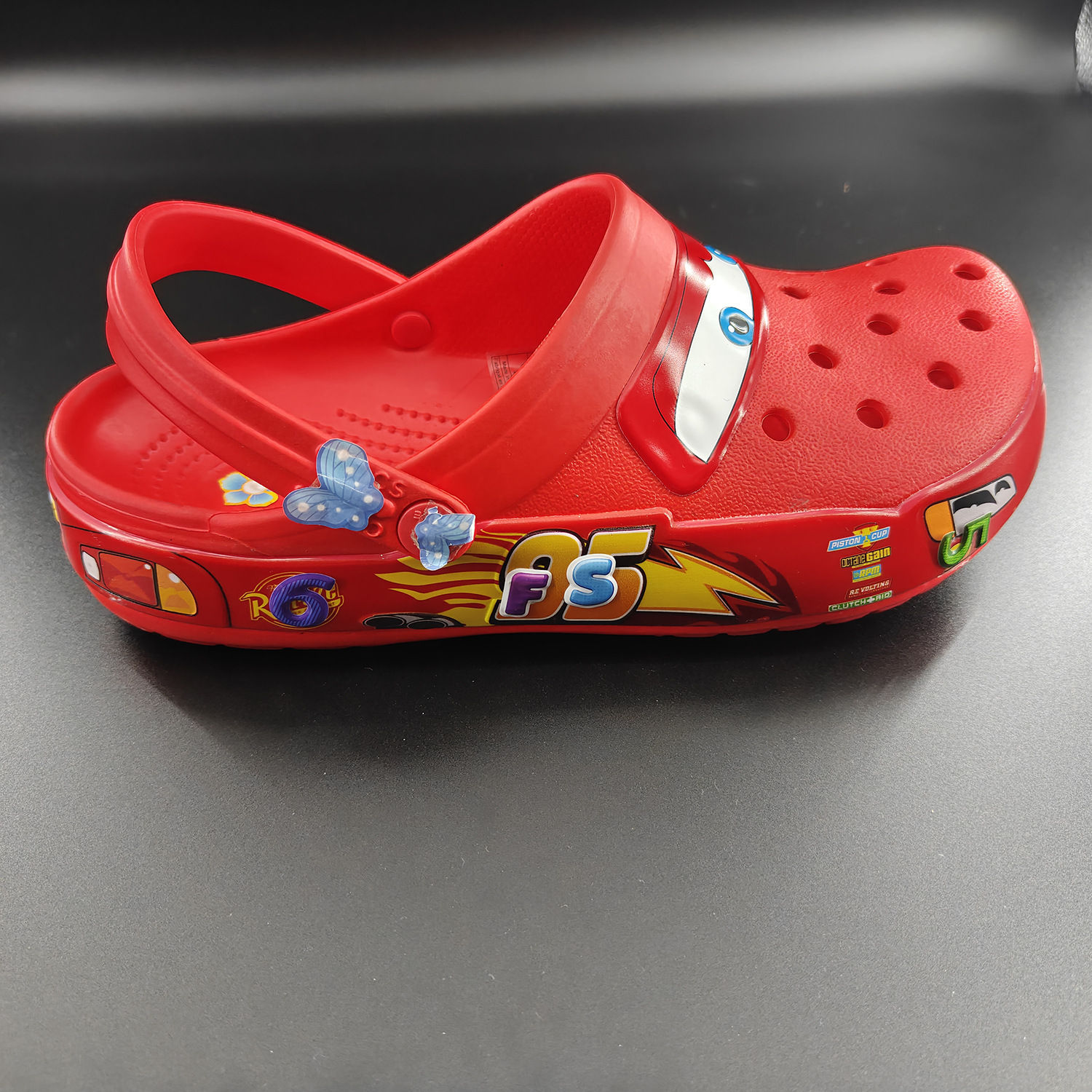 Spot 95 automóviles sin agujeros de lámpara zapatos de carreras movilización total zapatos para hombres y mujeres 2025 sandálias de playa spot al por mayor