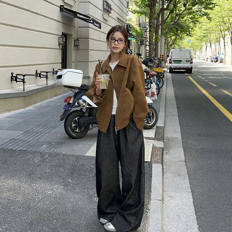 Retro suede jacket for women, suitable for spring and autumn, featuring a loose, American-style design, a turn-down collar, a casual motorcycle jacket look, and versatile outerwear